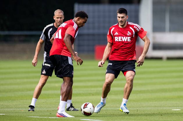 COLOGNE, GERMANY - JULY 17: Luka Lochoshvili (1. FC Koeln, 24) fights Youssoupha Niang (1. FC Koeln, 38) for the ball during a training session of season 2026 27 at Geissbockheim on July 17, 2026 in Cologne, Germany. North Rhine Westphalia Germany Copyright: xSteffiexWunderlx
