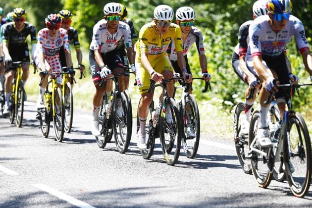 Danish Jonas Vingegaard of Team Visma-Lease a Bike wearing the red polka-dot jersey for best climber, Mexican Isaac Del Toro of UAE Team Emirates XRG and Slovenian Tadej Pogacar of UAE Team Emirates XRG wearing the yellow jersey of leader in the overall ranking pictured in action during stage 13 of the 2026 Tour de France cycling race, a stage of 205km from Dole to Belfort, on Friday 17 July 2026. The 113th edition of the Tour de France starts on Saturday 4 July in Barcelona, Spain, and will finish in Paris, France on the 26th of July. POOLxLUCAxBETTINI  x181335195x