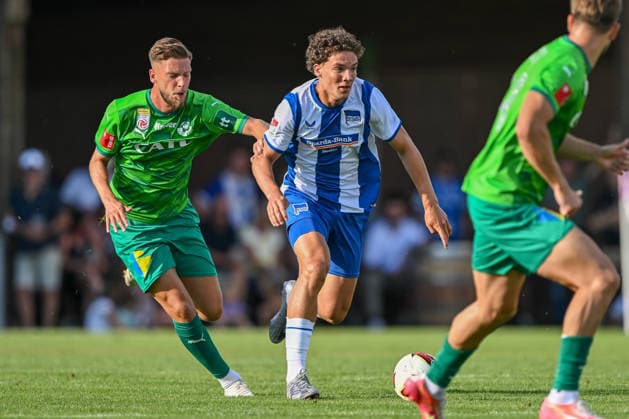 SOCCER - Wattens vs Hertha, test match KUNDL,AUSTRIA,17.JUL.26 - SOCCER - ADMIRAL Bundesliga, 2. DFL, 2. Deutsche Bundesliga, WSG Tirol vs Hertha BSC Berlin, test match. Image shows Nemanja Celic (Wattens) and Soufian Gouram (Hertha).  GEPAxpictures xDanielxSchoenherr
