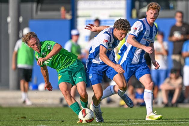 SOCCER - Wattens vs Hertha, test match KUNDL,AUSTRIA,17.JUL.26 - SOCCER - ADMIRAL Bundesliga, 2. DFL, 2. Deutsche Bundesliga, WSG Tirol vs Hertha BSC Berlin, test match. Image shows Raphael Gschoesser (Wattens) and Soufian Gouram (Hertha).  GEPAxpictures xDanielxSchoenherr