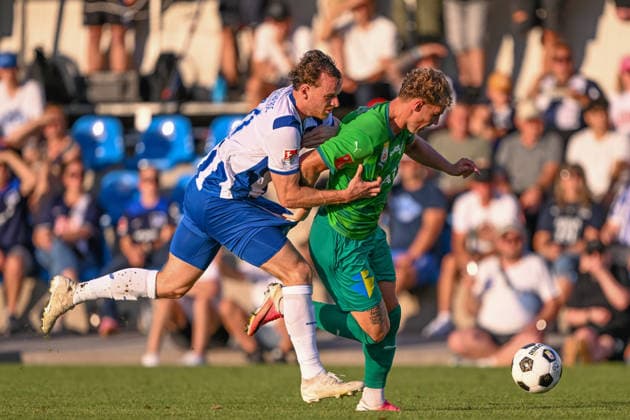 SOCCER - Wattens vs Hertha, test match KUNDL,AUSTRIA,17.JUL.26 - SOCCER - ADMIRAL Bundesliga, 2. DFL, 2. Deutsche Bundesliga, WSG Tirol vs Hertha BSC Berlin, test match. Image shows Pascal Klemens (Hertha) and Nikolai Baden Frederiksen (Wattens).  GEPAxpictures xDanielxSchoenherr