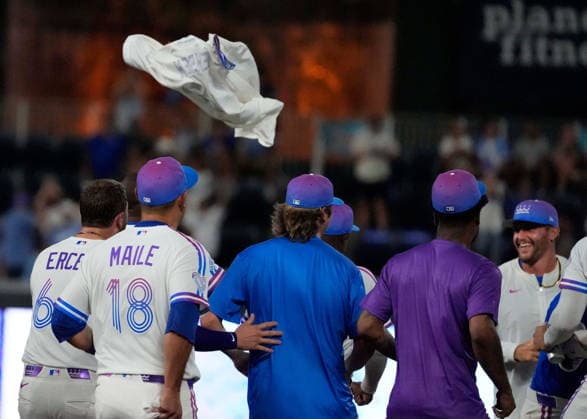 July 17, 2026: Kansas City Royals catcher Carter Jensen (22) looses his jersey after the game winning hit in the 10th inning against the Padres at Kauffman Stadium Kansas City, Missouri. CSM. Kansas City United States - ZUMAc04_ 20260717_zma_c04_182 Copyright: xJonxRobichaudx