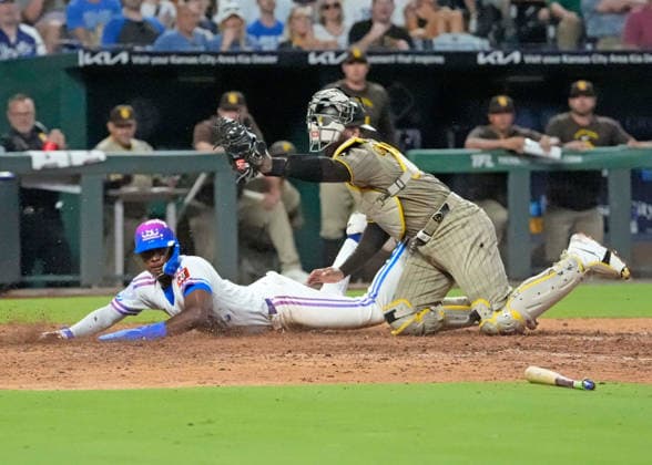 July 17, 2026: San Diego Padres catcher Luis Campusano (12) shows the ball to the umpire after tagging out Kansas City Royals second baseman Tyler Tolbert (2) at the plate at Kauffman Stadium Kansas City, Missouri. CSM. Kansas City United States - ZUMAc04_ 20260717_zma_c04_186 Copyright: xJonxRobichaudx