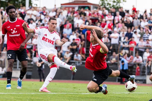 COLOGNE, GERMANY - JULY 18: Said El Mala (1. FC Koeln, 13) trying to score against Nik Anton Ortner (FC Rheinsued Koeln, 6) during the first friendly game of season 2026 27 between 1. FC Koeln vs FC Rheinsued Koeln at Suedstadion on July 18, 2026 in Cologne, Germany. North Rhine Westphalia Germany Copyright: xSteffiexWunderlx