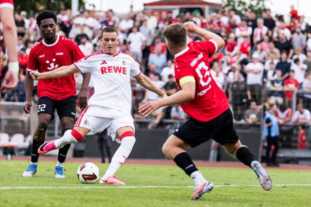 COLOGNE, GERMANY - JULY 18: Said El Mala (1. FC Koeln, 13) controls the ball against Nik Anton Ortner (FC Rheinsued Koeln, 6) during the first friendly game of season 2026 27 between 1. FC Koeln vs FC Rheinsued Koeln at Suedstadion on July 18, 2026 in Cologne, Germany. North Rhine Westphalia Germany Copyright: xSteffiexWunderlx