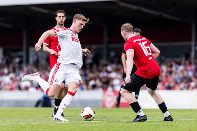 COLOGNE, GERMANY - JULY 18: Marius Buelter (Bülter, Bulter, 1. FC Koeln, 30) controls the ball against Tom Krieg (FC Rheinsued Koeln, 16) during the first friendly game of season 2026 27 between 1. FC Koeln vs FC Rheinsued Koeln at Suedstadion on July 18, 2026 in Cologne, Germany. North Rhine Westphalia Germany Copyright: xSteffiexWunderlx