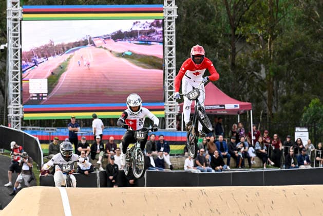 RECORD DATE NOT STATED 18th July 2026; Brisbane SX International BMX Centre, Brisbane, Queensland, Australia: 2026 UCI BMX Racing World Championships, Day Two; 835 Lucas ZHOU (Men Junior) CAN leads 833 David FERREIRA (Men Junior) SUI during the juniors quarter final heats NigelxOwen