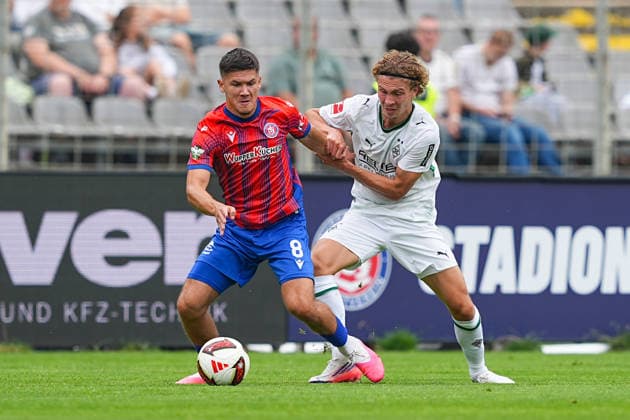 18.07.2026, xydrx, Fußball, Testspiel, Wuppertaler SV - Borussia Mönchengladbach, Saison 2026 2027, Stadion am Zoo: Duje Goles (Wuppertaler SV, 8) im Zweikampf gegen Hugo Bolin (Borussia Moenchengladbach, 38) DFB regulations prohibit any use of photographs as image sequences and or quasi-video. *** July 18, 2026, xydrx, soccer, friendly match, Wuppertaler SV vs. Borussia Mönchengladbach, 2026–2027 season, Stadion am Zoo, Duje Goles (Wuppertaler SV), 8 in a tackle against Hugo Bolin (Borussia Mönchengladbach), 38. DFB regulations prohibit any use of photographs as image sequences and or quasi-video. Copyright: HMBxMedia YannisxDreimann