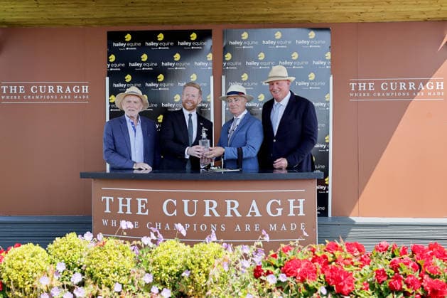 REPRO FREE *PRESS RELEASE NO REPRODUCTION FEE* EDITORIAL USE ONLY Curragh Racing Juddmonte Irish Oaks Weekend, Curragh Racecourse, Kildare 18 7 2026 Hailey Equine Irish European Breeders Fund Fillies Maiden The winning connections are presented with the trophy after the race The winning connections are presented with the trophy after the race 18 7 2026  Copyright: xLaszloxGeczox LG_18-07-2026_029165