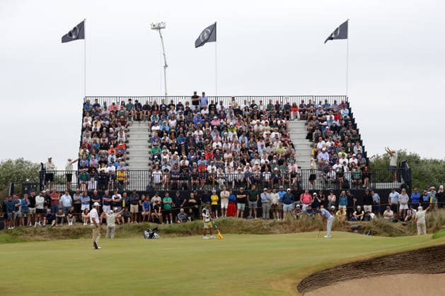 RECORD DATE NOT STATED 18th July 2026; Royal Birkdale Golf Club, Southport, Merseyside, England; The Open Championship Round Three; fans follow the action from the grandstand at the 9th green DavidxBlunsden