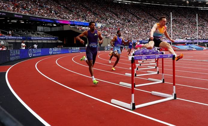 Kartson Warholm of Norway and Emil Agyekum of Germany during the 400m Mens Hurdles. The London Athletics Meet, Wanda Diamond League, London Stadium, London, UK - 18 Jul 2026London London Stadium United Kingdom  Copyright: xJamesxMarsh Shutterstockx 16996766m