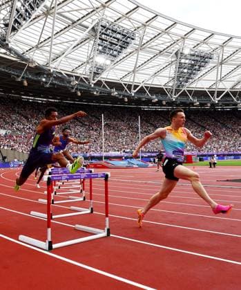 Kartson Warholm of Norway and Emil Agyekum of Germany during the 400m Mens Hurdles. The London Athletics Meet, Wanda Diamond League, London Stadium, London, UK - 18 Jul 2026London London Stadium United Kingdom  Copyright: xJamesxMarsh Shutterstockx 16996766o