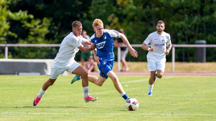 v.li.: Michael Martin (SGV, 8), Oskar Hencke (Hoffenheim, 41), Zweikampf, Spielszene, Duell, duel, tackle, tackling, Dynamik, Action, Aktion, 18.07.2026, Bad Friedrichshall (Deutschland), Fussball, Testspiel, TSG 1899 Hoffenheim - SGV Heilbronn-Freiberg, DFB DFL REGULATIONS PROHIBIT ANY USE OF PHOTOGRAPHS AS IMAGE SEQUENCES AND OR QUASI-VIDEO. *** From left: Michael Martin (SGV), 8, Oskar Hencke (Hoffenheim), 41, tackle, game scene, duel, tackle, tackling, dynamic, action, 18 July 2026, Bad Friedrichshall, Germany, soccer, friendly match, TSG 1899 Hoffenheim vs. SGV Heilbronn Freiberg, DFB and DFL regulations prohibit any use of photographs as image sequences and or quasi-video xozx