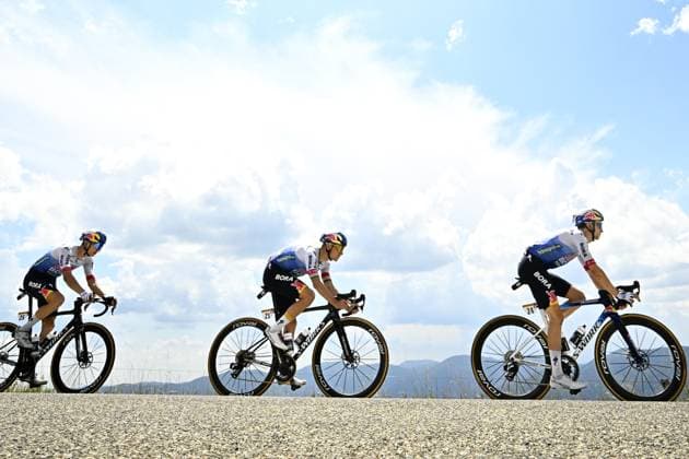 German Florian Lipowitz of Red Bull-BORA-hansgrohe, Belgian Remco Evenepoel of Red Bull-BORA-hansgrohe and Australian Jai Hindley of Red Bull-BORA-hansgrohe are pictured during stage 14 of the 2026 Tour de France cycling race, a stage of 155km from Mulhouse to Le Markstein Fellering, on Saturday 18 July 2026. The 113th edition of the Tour de France starts on Saturday 4 July in Barcelona, Spain, and will finish in Paris, France on the 26th of July. JASPERxJACOBS  x181422212x