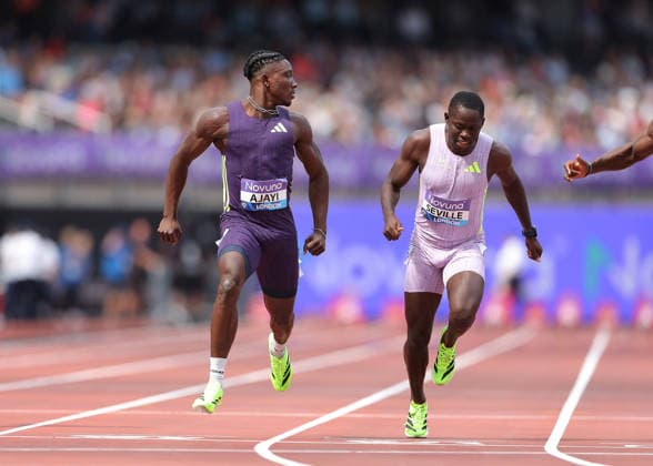 RECORD DATE NOT STATED 18th July 2026; London Stadium, London, England; 2026 Diamond League Novuna London Athletics Meet; Kanyinsola Ajayi of Nigeria celebrates finishing 1st in the men& x2019;s 100m race while looking over his shoulder at Oblique Seville of Jamaica who finished 2nd place JohnxPatrickxFletcher