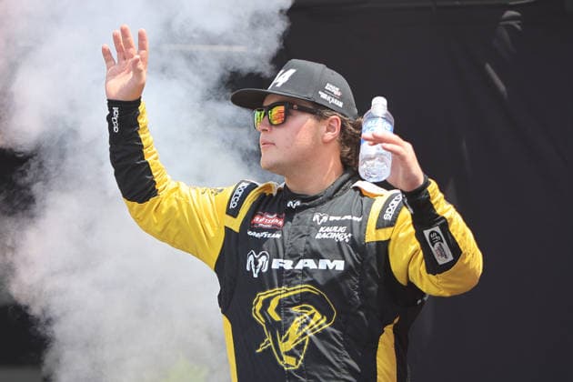 NORTH WILKESBORO, NC - JULY 18: Mini Tyrrell ( 14 Kaulig Racing RAM) waves to the fans prior to the running of the NASCAR, Motorsport, USA Craftsman Truck Series FaithFest 250 on July 18, 2026 at North Wilkesboro Speedway in North Wilkesboro, NC. (Photo by Jeff Robinson Icon Sportswire) AUTO: JUL 18 NASCAR CRAFTSMAN Truck Series Faith Fest 250 EDITORIAL USE ONLY Icon26071823801250