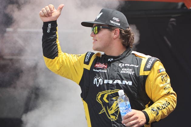 NORTH WILKESBORO, NC - JULY 18: Mini Tyrrell ( 14 Kaulig Racing RAM) waves to the fans prior to the running of the NASCAR, Motorsport, USA Craftsman Truck Series FaithFest 250 on July 18, 2026 at North Wilkesboro Speedway in North Wilkesboro, NC. (Photo by Jeff Robinson Icon Sportswire) AUTO: JUL 18 NASCAR CRAFTSMAN Truck Series Faith Fest 250 EDITORIAL USE ONLY Icon26071823813250