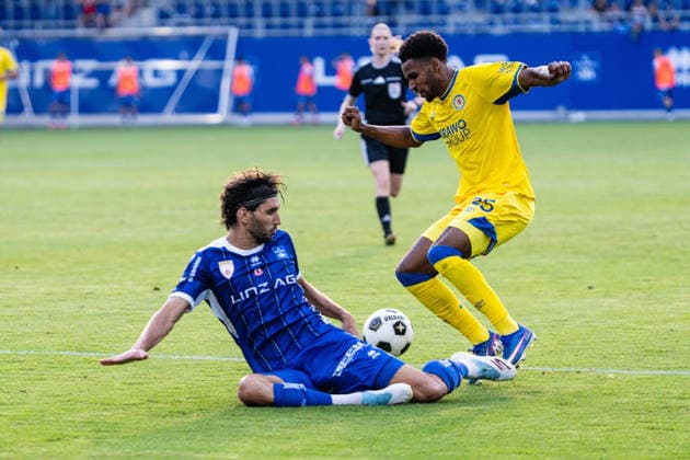 SOCCER - Linz vs Braunschweig, test match LINZ,AUSTRIA,18.JUL.26 - SOCCER - ADMIRAL 2. Liga, 2. DFL, 2. Deutsche Bundesliga, FC Blau Weiss Linz vs Eintracht Braunschweig, test match. Image shows Martin Moormann (Linz) and Sanoussy Ba (Braunschweig).  GEPAxpictures xJulioxArellano