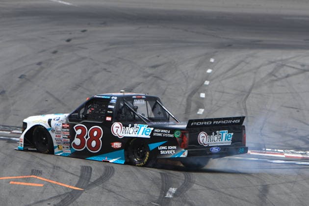 NORTH WILKESBORO, NC - JULY 18: Chandler Smith ( 38 Front Row Motorsports QuickTie Ford) celebrates after winning the NASCAR, Motorsport, USA Craftsman Truck Series FaithFest 250 on July 18, 2026 at North Wilkesboro Speedway in North Wilkesboro, NC. (Photo by Jeff Robinson Icon Sportswire) AUTO: JUL 18 NASCAR CRAFTSMAN Truck Series Faith Fest 250 EDITORIAL USE ONLY Icon26071825972250