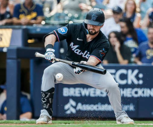 Miami Marlins designated hitter Liam Hicks lays down a bunt in the second inning of the MLB, Baseball Herren, USA game between the Miami Marlins and the Milwaukee Brewers at American Family Field in Milwaukee, Wisconsin on Saturday, July 18, 2026.  MIL20260718806 TANNENxMAURY