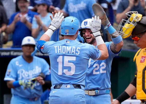 July 18, 2026: Kansas City Royals catcher Carter Jensen (22) congratulates Kansas City Royals center fielder Lane Thomas (15) after his home run in the 1st inning against the Padres at Kauffman Stadium Kansas City, Missouri. CSM. Kansas City United States - ZUMAc04_ 20260718_zma_c04_003 Copyright: xJonxRobichaudx