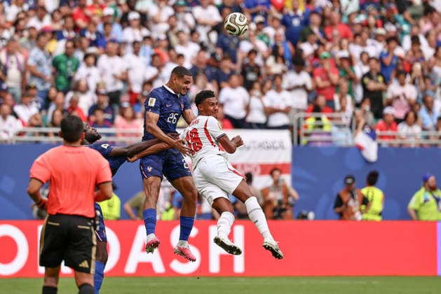 MIAMI GARDENS, FL - JULY 18: Maxence Lacroix 26 of France and Ollie Watkins 19 of England battle for a ball during a FIFA World Cup, WM, Weltmeisterschaft, Fussball 26 Bronze Final match between France and England on July 18,2026 at Miami Stadium, in Miami Gardens, Fla.(Photo by Chris Arjoon Icon Sportswire) SOCCER: JUL 18 FIFA World Cup 26 Bronze Final - France v England EDITORIAL USE ONLY Icon26071800000016