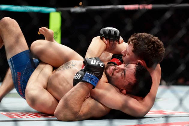 July 18, 2026, Oklahoma City, Oklahoma, United States: CHASE HOOPER and MITCH RAMIREZ fight in their 3-round Lightweight bout at UFC Fight Night OKC at the Paycom Center in Oklahoma City, OK. Oklahoma City United States - ZUMAs346 20260718_zsp_s346_036 Copyright: xAlejandroxSalazarx