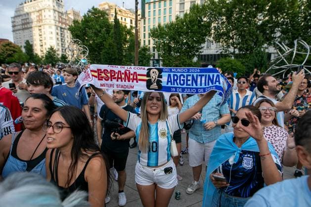 July 18, 2026, Madrid, Madrid, Spain: A female fan wears a commemorative scarf for the World Cup final between Spain and Argentina during a pre-match rally in Madrid.Argentine football fans gathered in Madrid s Plaza EspaoÂ±a to show their support for their team ahead of the 2026 FIFA World Cup, WM, Weltmeisterschaft, Fussball final against Spain in New York, USA. Argentine Fan Rally In Madrid  - ZUMAs197 0862030805st Copyright: xDavidxCanalesx