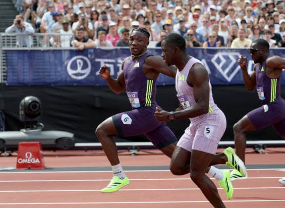 Sport Themen der Woche KW29 (260719) -- LONDON, July 19, 2026 -- Nigeria s Kayinsola Ajayi (L) competes during the men s 100m final at the 2026 World Athletics Diamond League in London, Britain, on July 18, 2026. ) (SP)BRITAIN-LONDON-ATHLETICS-DIAMOND LEAGUE LixYing 