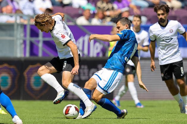 19.07.2026, xtgx, Fussball - Testspiel Erzgebirge Aue - FC Schalke 04 v.l. Devin Angleberger (Aue, 3), Ron Schallenberg (Schalke, 6) Zweikampf, Duell, Kampf, tackle (DFL DFB REGULATIONS PROHIBIT ANY USE OF PHOTOGRAPHS as IMAGE SEQUENCES and or QUASI-VIDEO) Aue *** July 19, 2026, xtgx, Soccer Friendly: Erzgebirge Aue vs. FC Schalke 04, featuring Devin Angleberger (Aue), 3, Ron Schallenberg (Schalke), 6, tackle, duel, battle, DFL and DFB regulations prohibit any use of photographs as image sequences and or quasi-video, Aue