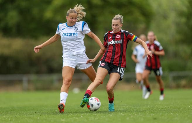 GER, Frankfurt, Eintracht Frankfurt vs SC Sand, Vorbereitung, Fussball, DFB, Spielzeit 2026 2027, Sportanlage Goldstein, Testspiel im Bild v.l.: Sophia Geber (SC Sand), Laura Freigang (Eintracht Frankfurt Frauen 10) DFB DFL REGULATIONS PROHIBIT ANY USE OF PHOTOGRAPHS AS IMAGE SEQUENCES AND OR QUASI-VIDEO, 19.07.2026 *** GER, Frankfurt, Eintracht Frankfurt vs. SC Sand, Preseason, Soccer, DFB, 2026–2027 Season, Goldstein Sports Complex, Photo from the friendly match (from left): Sophia Geber (SC Sand), Laura Freigang (Eintracht Frankfurt Women’s Team 10). DFB and DFL regulations prohibit any use of photographs as image sequences and or quasi-video. July 19, 2026 Copyright: HMBxMedia HendrikxHamelau