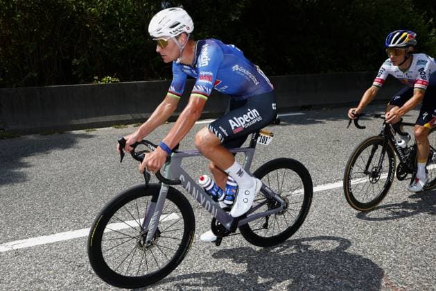 Dutch Mathieu van der Poel of Alpecin-Premier Tech and Belgian Remco Evenepoel of Red Bull-BORA-hansgrohe pictured during stage 15 of the 2026 Tour de France cycling race, a stage of 184km from Champagnole to Plateau de Solaison, on Sunday 19 July 2026. The 113th edition of the Tour de France starts on Saturday 4 July in Barcelona, Spain, and will finish in Paris, France on the 26th of July. POOLxLUCAxBETTINI  x181473700x