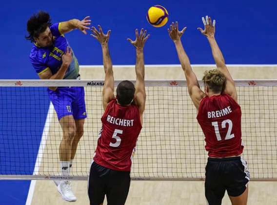 WomenÕs Volleyball Nations League - Belgrade 2026 Ukraine s Vasyl Tupchii spikes the ball against Germany s Anton Brehme during the MenÕs Volleyball Nations League Pool 7 match between Germany and Ukraine at Belgrade Arena on July 19, 2026 in Belgrade, Serbia. Belgrade Serbia Copyright: xSrdjanxStevanovicx x