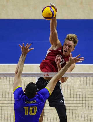 Women™s Volleyball Nations League - Belgrade 2026 Germany s Anton Brehme spikes the ball against Ukraine s Yurii Semeniuk during the Men™s Volleyball Nations League Pool 7 match between Germany and Ukraine at Belgrade Arena on July 19, 2026 in Belgrade, Serbia. Belgrade Serbia Copyright: xSrdjanxStevanovicx x