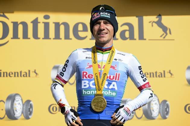 Belgian Remco Evenepoel of Red Bull-BORA-hansgrohe pictured on the podium after winning stage 15 of the 2026 Tour de France cycling race, a stage of 184km from Champagnole to Plateau de Solaison, on Sunday 19 July 2026. The 113th edition of the Tour de France starts on Saturday 4 July in Barcelona, Spain, and will finish in Paris, France on the 26th of July. DAVIDxPINTENS  x181486374x