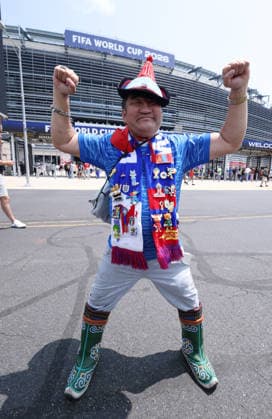 New Jersey, USA, 19th July 2026. A fan with many badges of previous finals poses outside the stadium before the Spain vs Argentina FIFA World Cup, WM, Weltmeisterschaft, Fussball final match at the Metlife Stadium, New Jersey. Picture credit should read: Paul Terry Sportimage EDITORIAL USE ONLY. No use with unauthorised audio, video, data, fixture lists, club league logos or live services. Online in-match use limited to 120 images, no video emulation. No use in betting, games or single club league player publications. SPI_007_PT_Spain_Argentina SPI-4862-0007