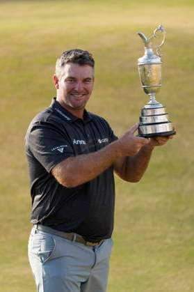 SOUTHPORT, ENGLAND - JULY 19: Ryan Fox (NZ) holds the Claret Jug aloft after winning the 154th Open Championship at the Royal Birkdale Golf Club, Southport on July 19, 2026 in Merseyside, England The 154th British Open Championship