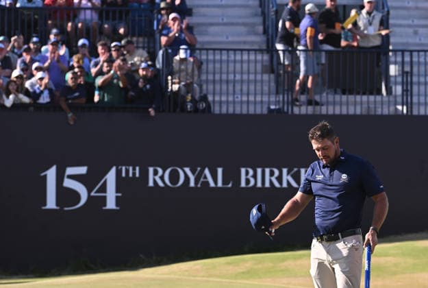 Bryson Dechambeau (USA) looks visibly upset after finishing his round on the 18th Green, as despite some fantastic support he suffered some horrible abuse accusing him of being a cheat 154th Open Golf Championships, Royal Birkdale, Southport, UK - 19 Jul 2026Southport Royal Birkdale United Kingdom  Copyright: xGreigxCowie Shutterstockx 16988299bv