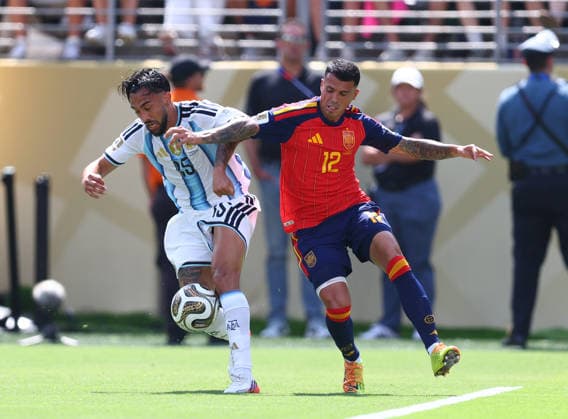 New Jersey, USA, 19th July 2026. Nicolas Gonzalez of Argentina tussles with Pedro Porro of Spain during the Spain vs Argentina FIFA World Cup, WM, Weltmeisterschaft, Fussball final match at the Metlife Stadium, New Jersey. Picture credit should read: Paul Terry Sportimage EDITORIAL USE ONLY. No use with unauthorised audio, video, data, fixture lists, club league logos or live services. Online in-match use limited to 120 images, no video emulation. No use in betting, games or single club league player publications. SPI_042_PT_Spain_Argentina SPI-4862-0042