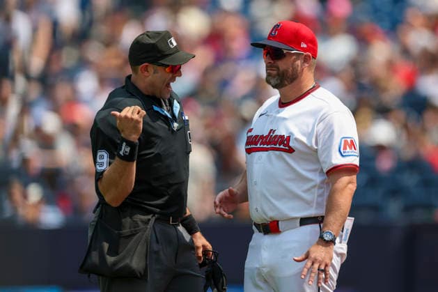 July 19, 2026: Umpire Alex MacKay (9) discusses a play with Cleveland Guardians manager Stephen Vogt (12) during the fifth inning of the Major League Baseball game between the Pittsburgh Pirates and Cleveland Guardians at Progressive Field in Cleveland, Ohio. CSM Cleveland United States of America - ZUMAc04_ 20260719_zma_c04_019 Copyright: xBrianxFisherx