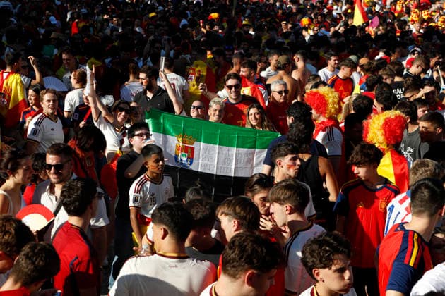 July 19, 2026, Madrid, Madrid, Spain: Thousands of Spanish soccer fans gather at the Puente del Rey esplanade to watch the highly anticipated 2026 World Cup Final match being played between Spain and Argentina on a giant screen installed by the Madrid City Council. The enthusiastic supporters braved the intense summer heat of the capital, arriving with hats, their faces painted in the national colors, and waving flags to passionately cheer for the Spanish national team, Nationalteam As the historic championship clash between the European and South American powerhouses unfolded, the atmosphere in the Madrid Rio park transformed into a tense and vibrant sea of red and yellow. The devoted crowd experienced every crucial play, foul, and shot on goal with overwhelming collective emotion and anxiety, dreaming of lifting the coveted trophy. Madrid Spain - ZUMAo127 20260719_zep_o127_028 Copyright: xHugoxOrtunox