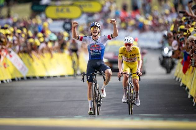 Belgian Remco Evenepoel of Red Bull-BORA-hansgrohe celebrates as he crosses the finish line to win stage 15 of the 2026 Tour de France cycling race, a stage of 184km from Champagnole to Plateau de Solaison, on Sunday 19 July 2026. The 113th edition of the Tour de France starts on Saturday 4 July in Barcelona, Spain, and will finish in Paris, France on the 26th of July. DAVIDxPINTENS  x181504018x