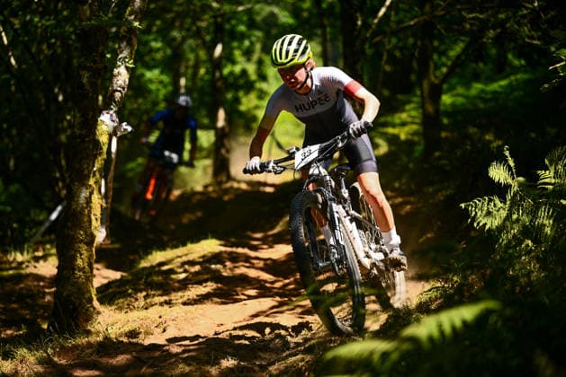 2026 Lloyds National MTB XCO Championships Picture by Olly Hassell SWpix.com - 19 07 2026 - Cycling - British Cycling National Championships - 2026 Lloyds National MTB XCO Championships - Forest of Ae, Dumfries & Galloway, Scotland - Senior, U23, Junior, Master 30, 40, 50, 60 Female - Grace Inglis (Team HUP) Copyright: x xSWpix.comx(t axPhotographyxHubxLtd)xOllyxHassell SWpix.comx SWP-3030-15402