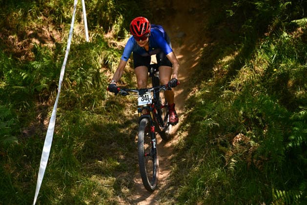 2026 Lloyds National MTB XCO Championships Picture by Olly Hassell SWpix.com - 19 07 2026 - Cycling - British Cycling National Championships - 2026 Lloyds National MTB XCO Championships - Forest of Ae, Dumfries & Galloway, Scotland - Senior, U23, Junior, Master 30, 40, 50, 60 Female - Melanie Alexander Copyright: x xSWpix.comx(t axPhotographyxHubxLtd)xOllyxHassell SWpix.comx SWP-3030-15415