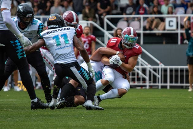 Adam Zouzelka 11, Prague Lions being tackled, Divine Buckrham 11, Munich Ravens , Prague Lions vs Munich Ravens, American Football, EUROPEAN FOOTBALL ALLIANCE (EFA), Week 10, 2026, 19.07.2026 Praha MÄ›stskÃ½ Stadion Czechia Copyright: xM51x