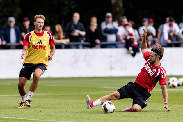 COLOGNE, GERMANY - JULY 20: Jan Thielmann (1. FC Koeln, 29) steals the ball off Sebastian Sebulonsen (1. FC Koeln, 28) during a training session of season 2026 27 at Geissbockheim on July 20, 2026 in Cologne, Germany. North Rhine Westphalia Germany Copyright: xSteffiexWunderlx
