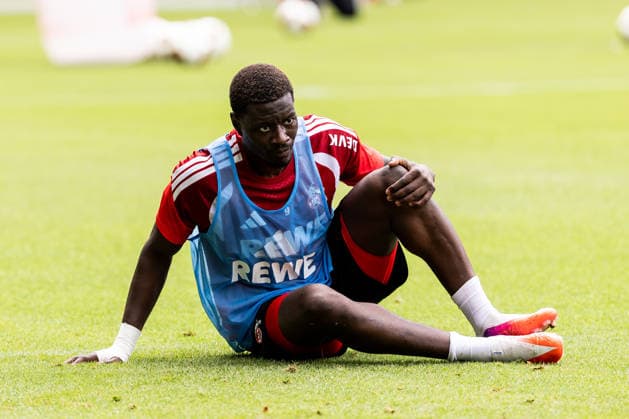 COLOGNE, GERMANY - JULY 20: Ragnar Ache (1. FC Koeln, 9) holding his knee after being fouled during a training session of season 2026 27 at Geissbockheim on July 20, 2026 in Cologne, Germany. North Rhine Westphalia Germany Copyright: xSteffiexWunderlx