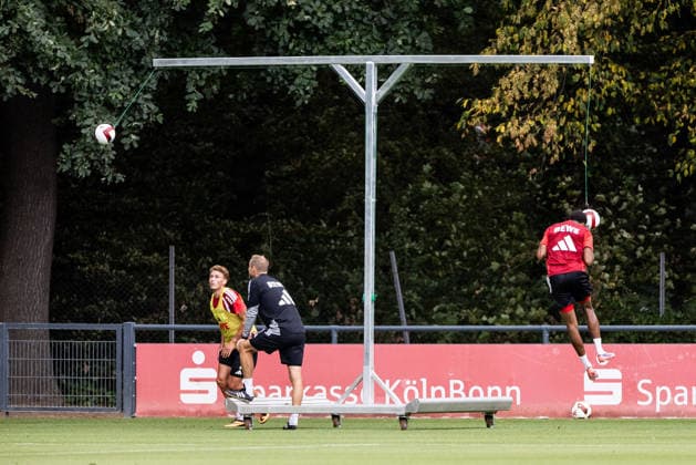 COLOGNE, GERMANY - JULY 20: Sebastian Sebulonsen (1. FC Koeln, 28) and Youssoupha Niang (1. FC Koeln, 38) training with the header training rig during a training session of season 2026 27 at Geissbockheim on July 20, 2026 in Cologne, Germany. North Rhine Westphalia Germany Copyright: xSteffiexWunderlx