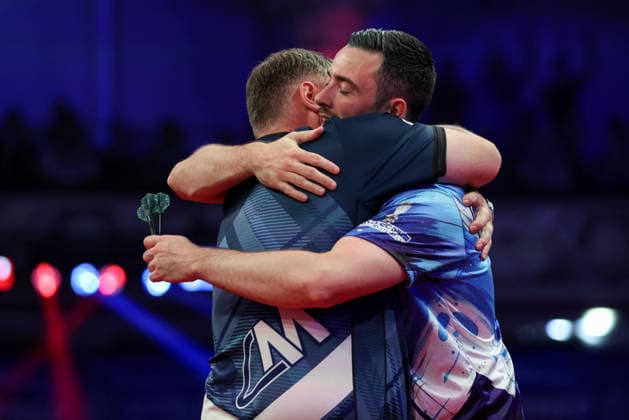 RECORD DATE NOT STATED 20th July 2026, Winter Gardens, Blackpool, Lancashire, England; 2026 Betfred World Matchplay Darts, Day Three; Cameron Menzies and Luke Humphries hug following their game in which Cameron Menzies won AidanxHunter