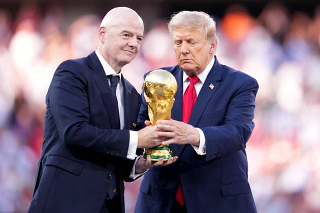 2026-07-19 Spain v Argentina - Final - FIFA World Cup, WM, Weltmeisterschaft, Fussball 2026 EAST RUTHERFORD, UNITED STATES - JULY 19: U.S. President Donald Trump and FIFA President Gianni Infantino hold the FIFA World Cup Winner s Trophy before handing over to captain Rodri of Spain at the award ceremony after the Final - FIFA World Cup 2026 match between Spain and Argentina at New York New Jersey Stadium on July 19, 2026 in East Rutherford, New Jersey. (Photo by Pablo Morano BSR Agency) East Rutherford United States Content not available for redistribution in The Netherlands directly or indirectly through any third parties. Copyright: xBSRxAgencyx